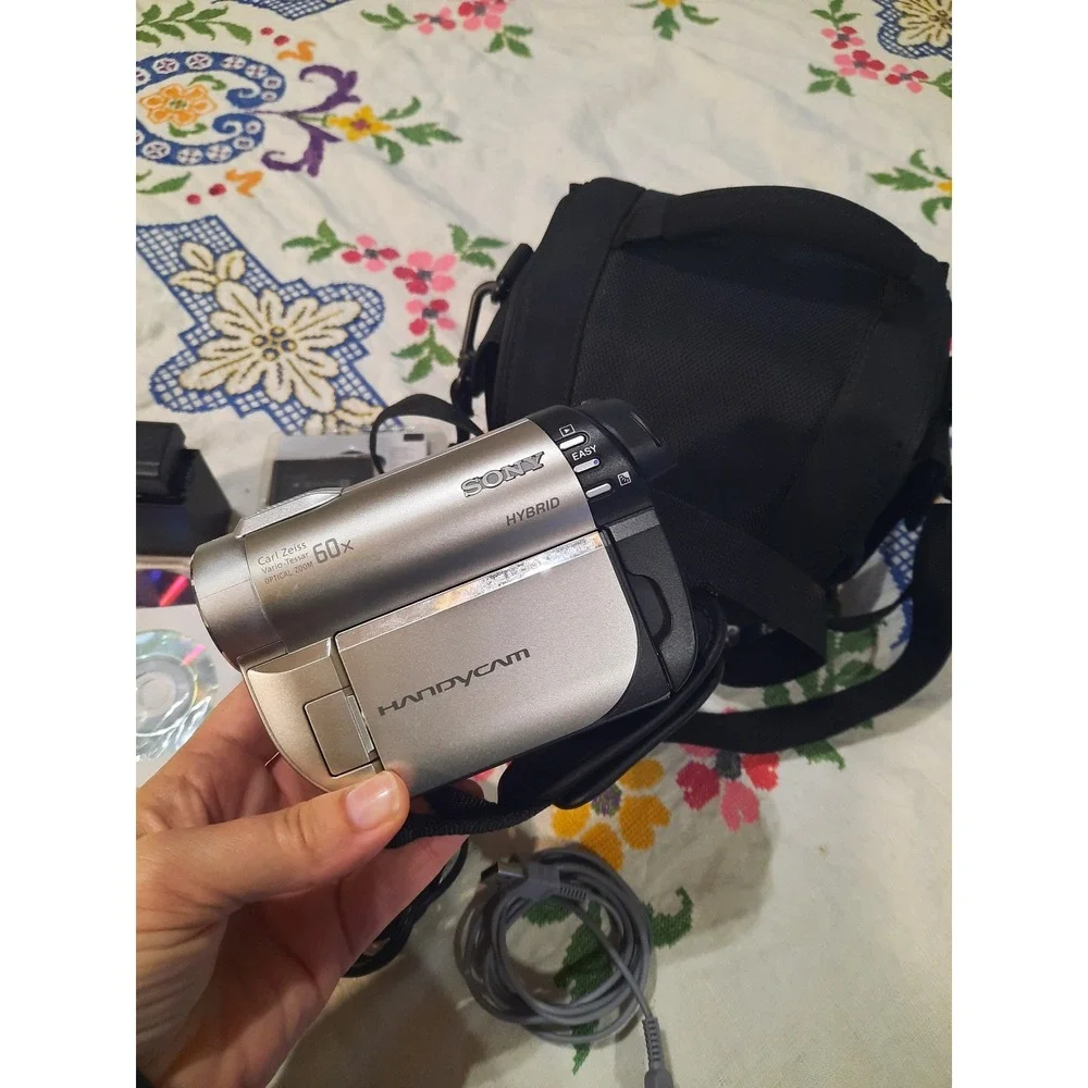 Sony Handycam DCR-DVD650 Camcorder 60x Zoom Bundle with New NP-FV100 Battery